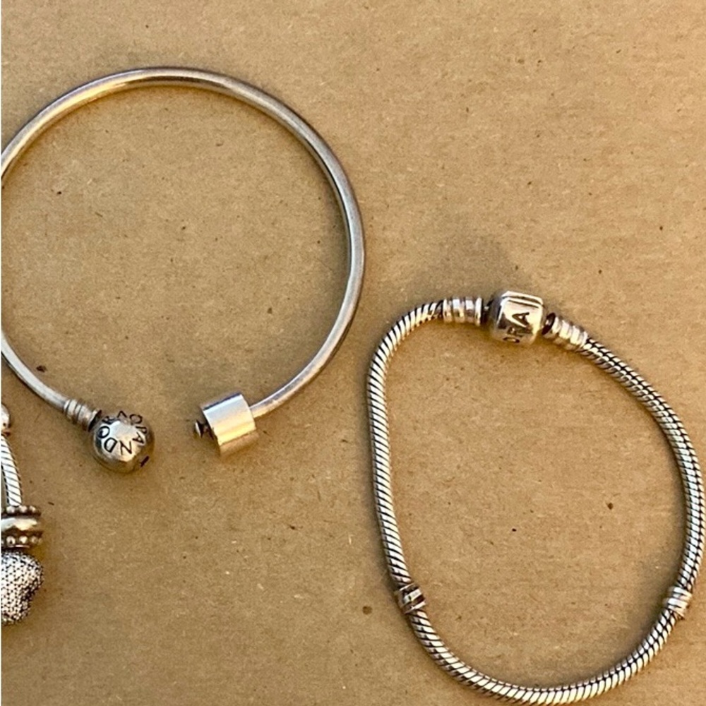 Three pandora bracelets, selling separately for $50 each or as a group